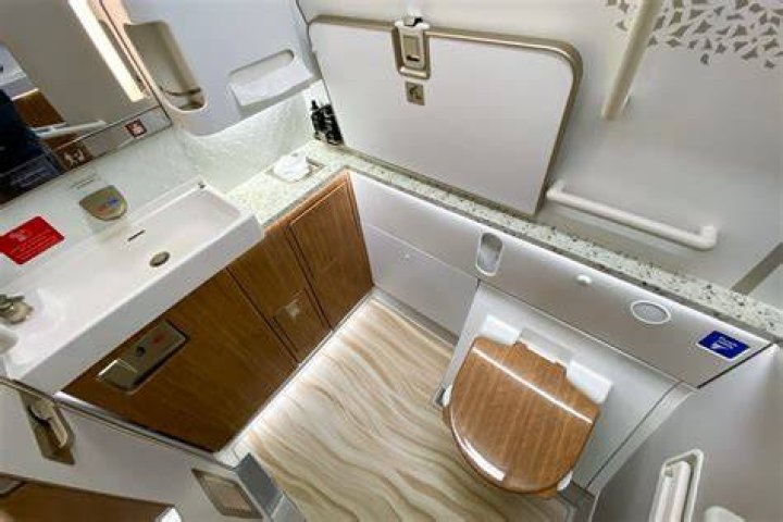 Can economy passengers use first class bathroom?