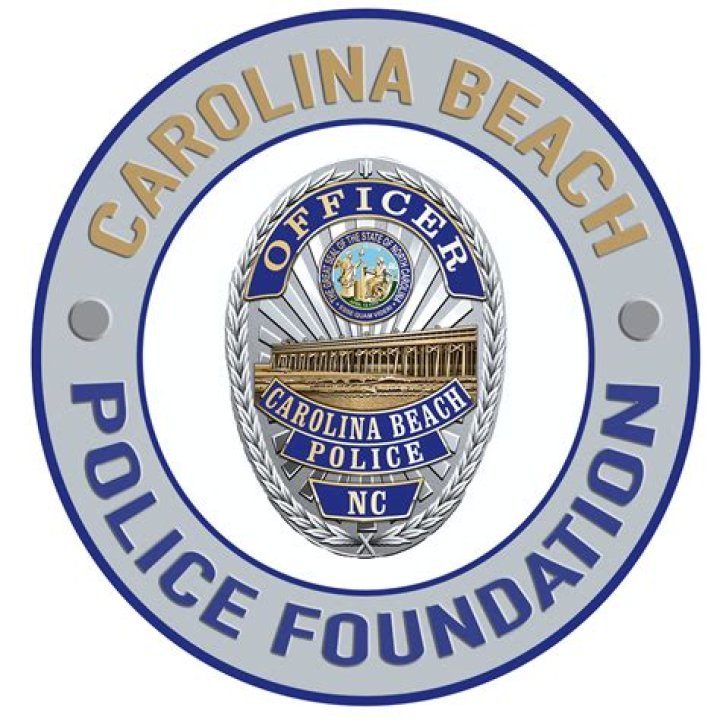 Carolina Beach Police Department Pulling Cow From Water