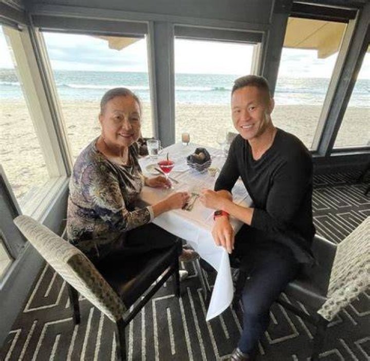 Chris Sheng with his mother