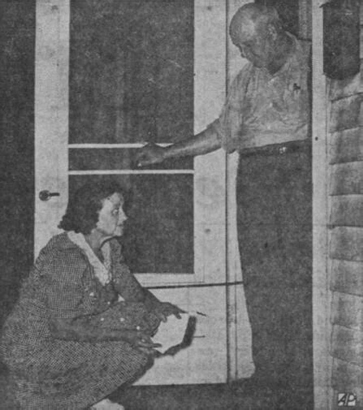 Couple Examines Handkerchief