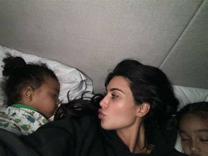 Kim Kardashian Snuggles Up With Saint, Chicago and Psalm While Munching On Cupcakes