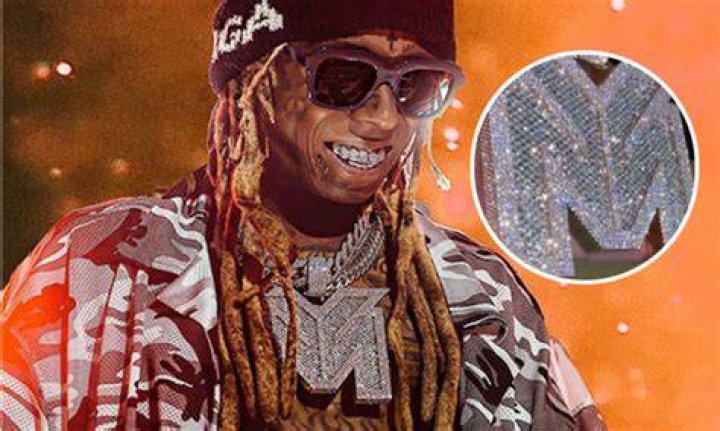 Lil Wayne Reps His Label With Blinding Young Money Chain