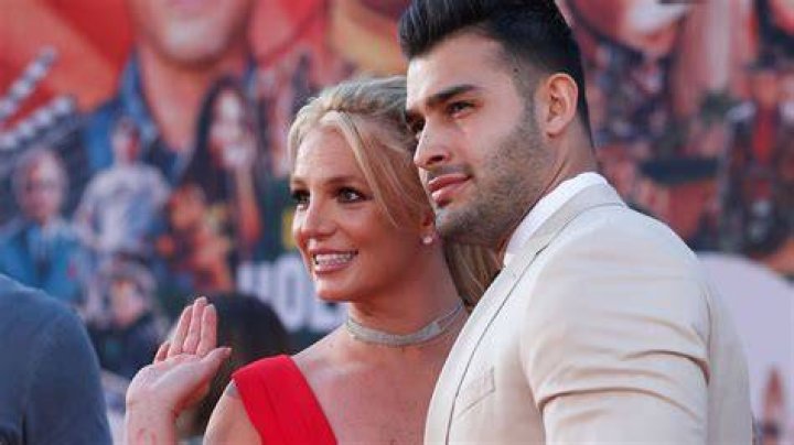 Sam Asghari Britney Spears date cuddling mother's day post ponytail sweater tank top