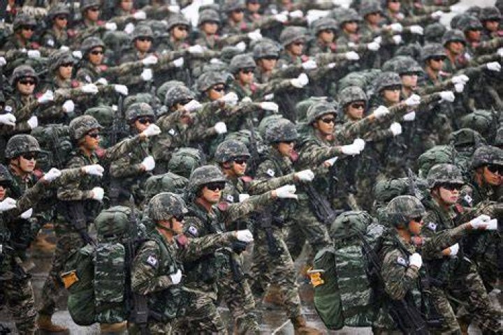 South Korean Soldier And Kijong Dong